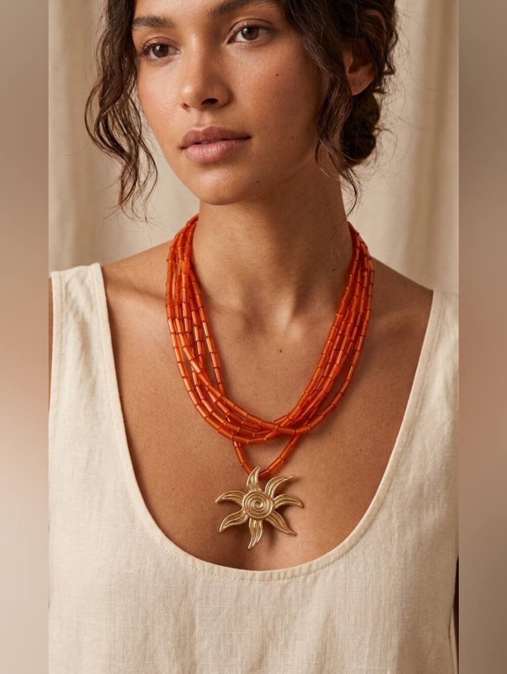 Orange Beaded Necklace with Gold Sun Pendant